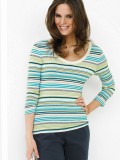 girl in rainbow stripped top black pants